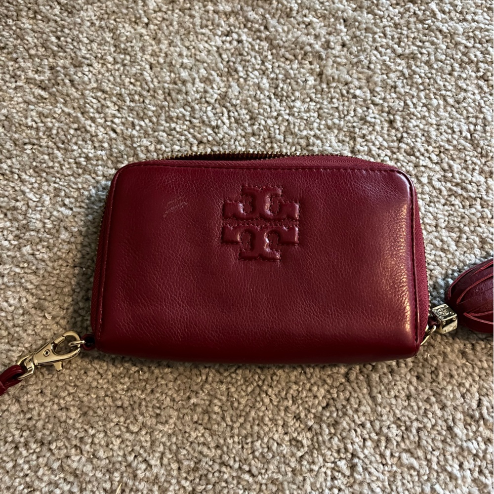 Tory Burch burgundy wristlet